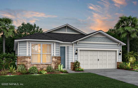 127 Shell Crk Court St. Augustine, FL 32086 - Photo 18 of 21 a front view of house with a garden