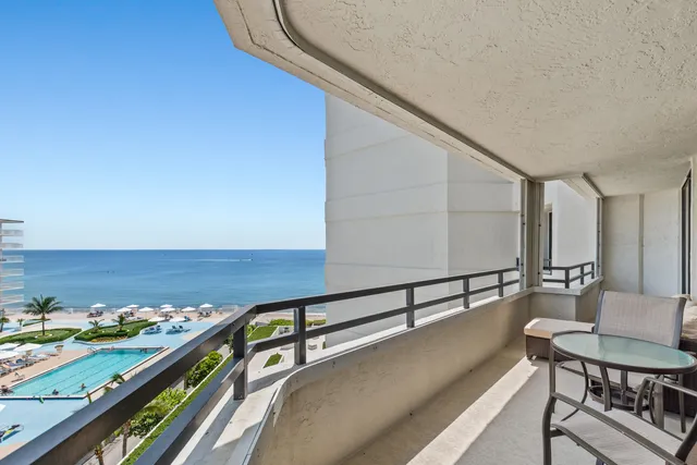 a view of a living room and dining room