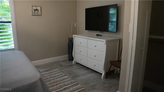 a room with a flat screen tv