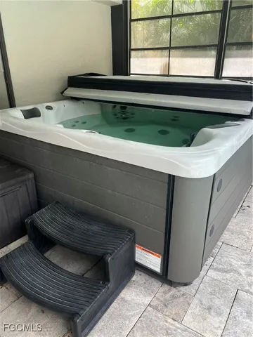 a view of a swimming pool with a porch