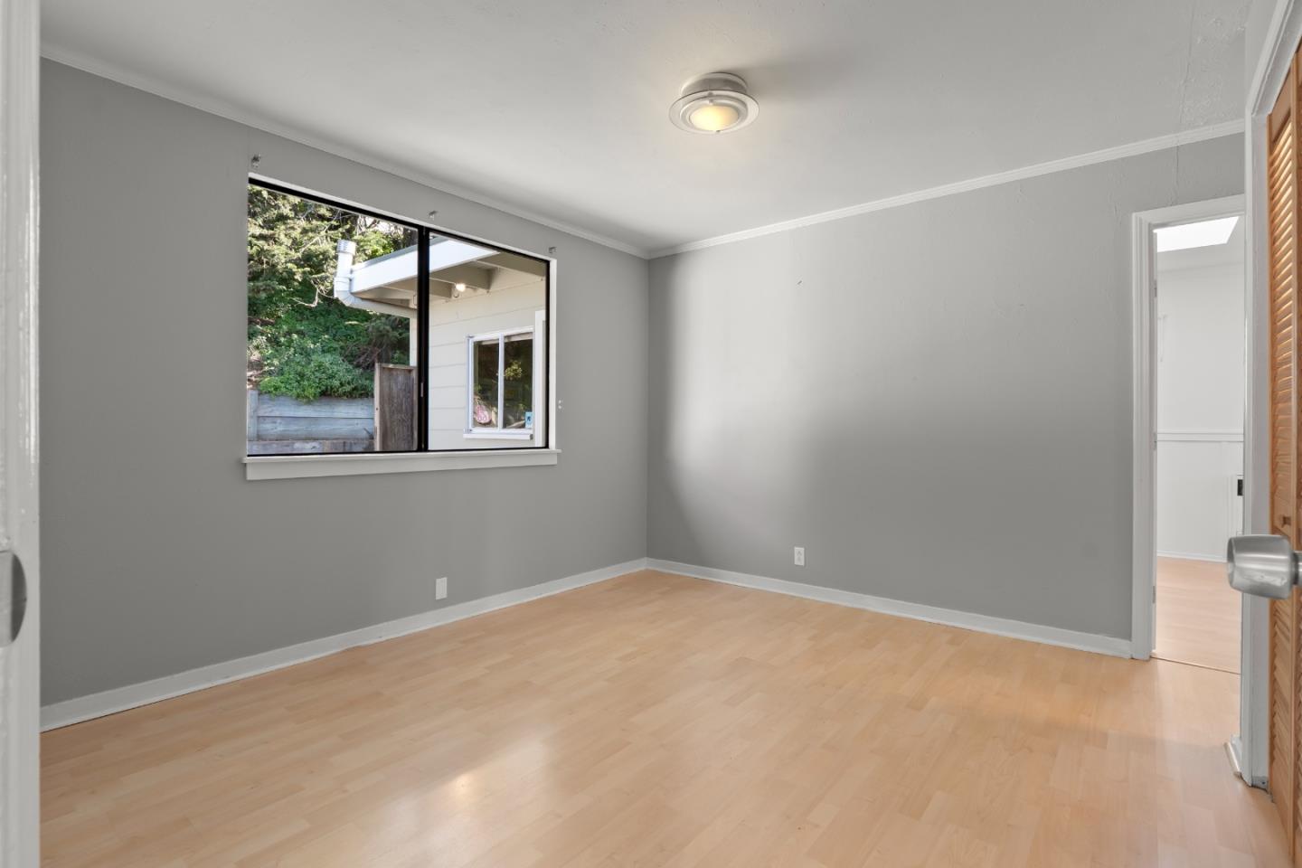 443 Monterey Road Pacifica, CA 94044 - Photo 13 of 26 a view of an empty room with a window