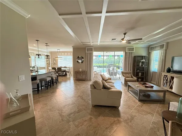 a living room with furniture and a table