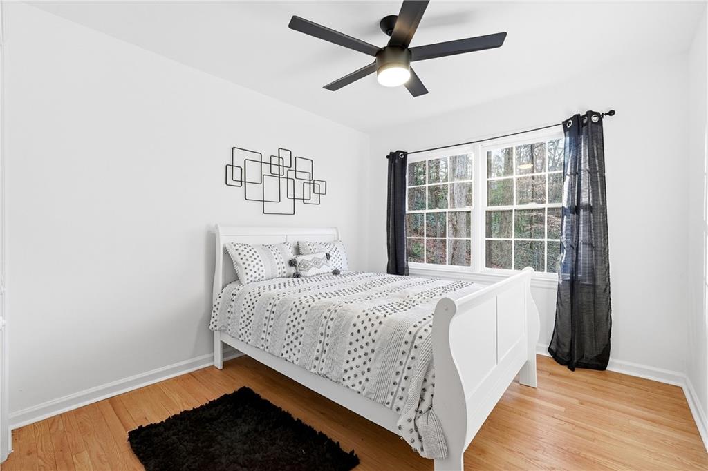 2520 Overlook Way Northeast Atlanta, GA 30345 - Photo 18 of 31 a bedroom with a bed and window