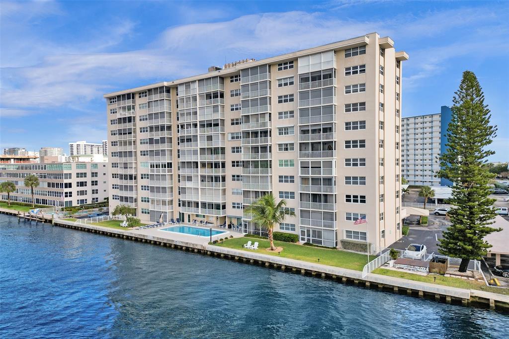 303 North Riverside Drive, Unit 403 Pompano Beach, FL 33062 - Photo 2 of 31 a view of a large building