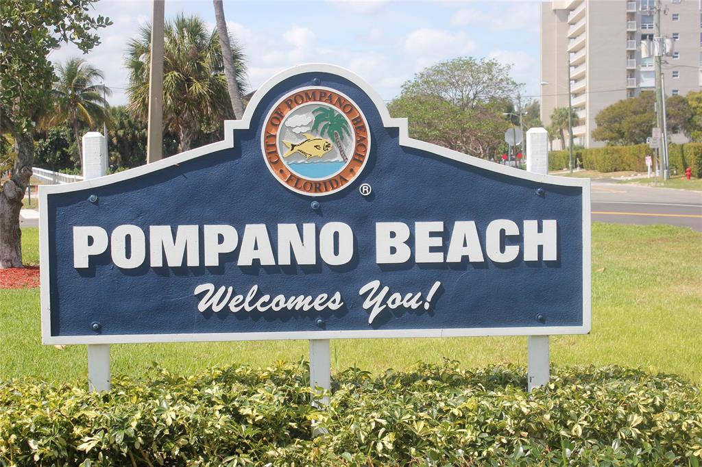 303 North Riverside Drive, Unit 403 Pompano Beach, FL 33062 - Photo 31 of 31 a view of outdoor space with sign board