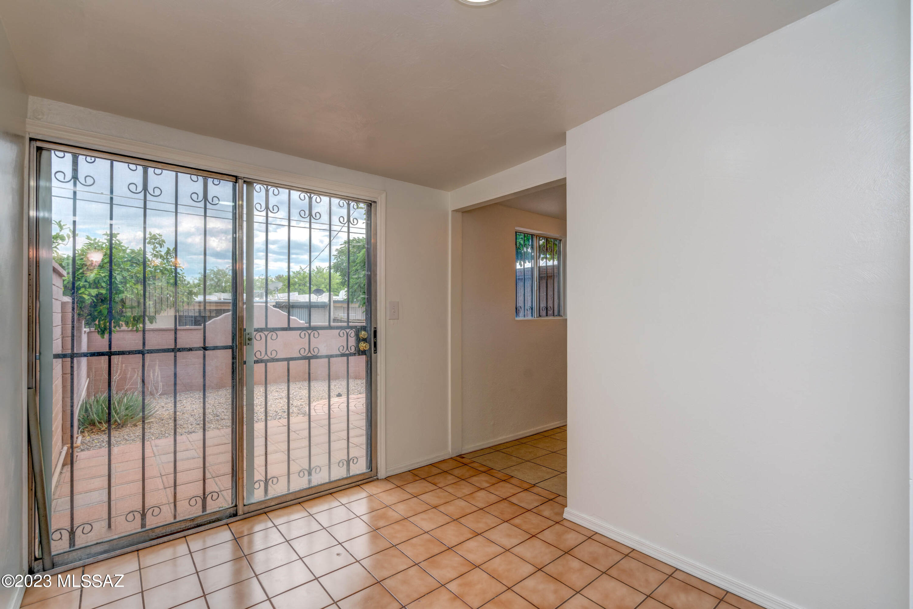 1845 West Caravelle Road Tucson, AZ 85713 - Photo 20 of 31 a view of a room that has a sliding door