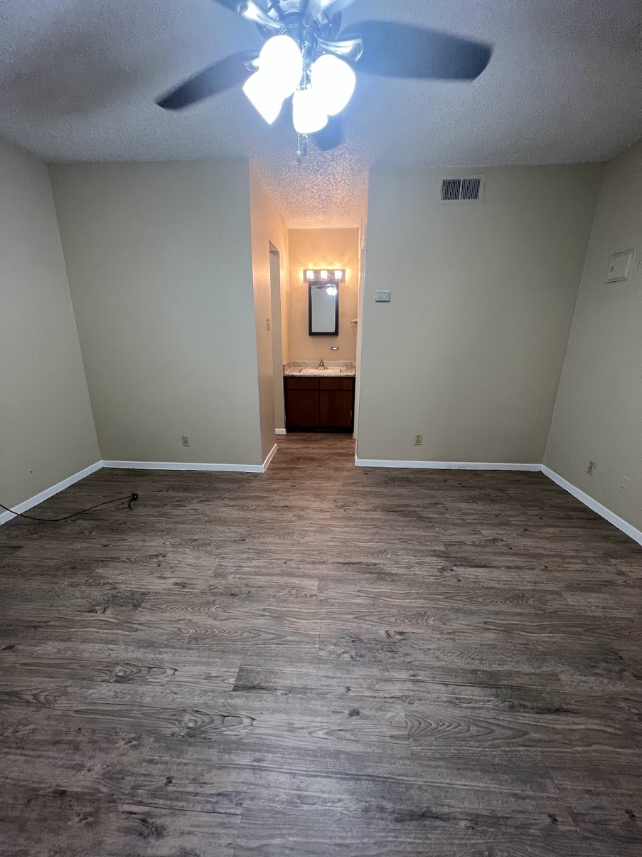 202 East 32nd Street, Unit 2 Austin, TX 78705 - Photo 11 of 22 a view of a livingroom with wooden floor