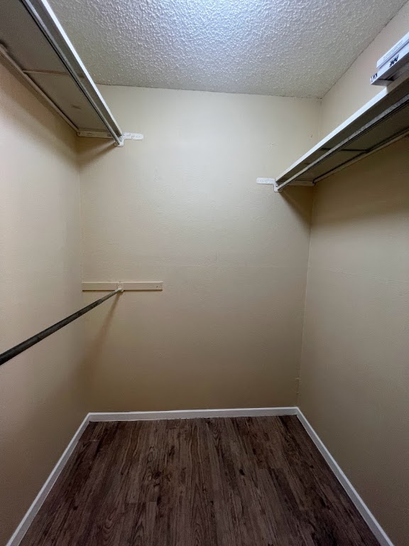 202 East 32nd Street, Unit 2 Austin, TX 78705 - Photo 18 of 22 a view of a room with wooden floor and white walls