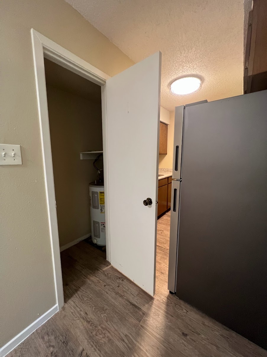 202 East 32nd Street, Unit 2 Austin, TX 78705 - Photo 20 of 22 an empty room with wooden floor and closet