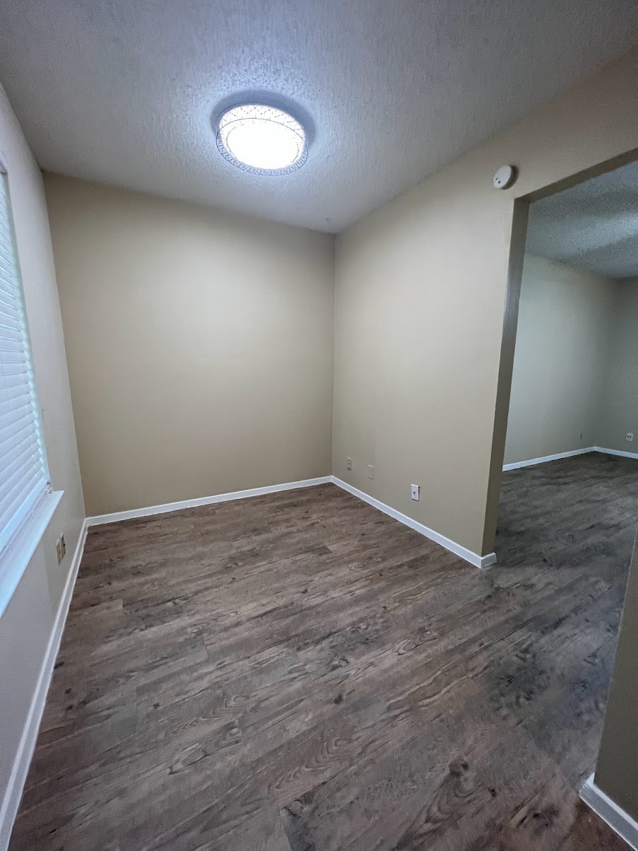 202 East 32nd Street, Unit 2 Austin, TX 78705 - Photo 2 of 22 wooden floor in an empty room