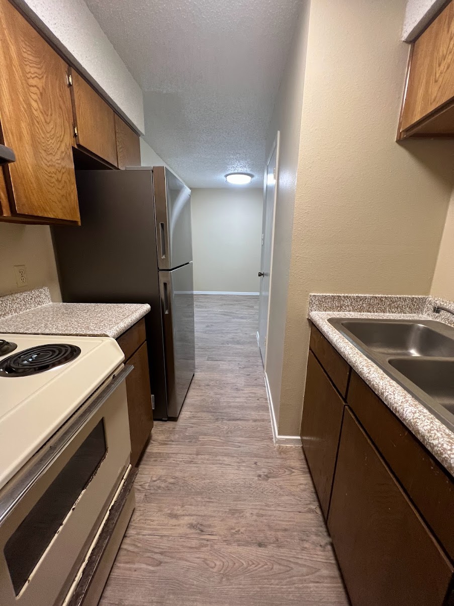 202 East 32nd Street, Unit 2 Austin, TX 78705 - Photo 6 of 22 a view of a kitchen with a sink