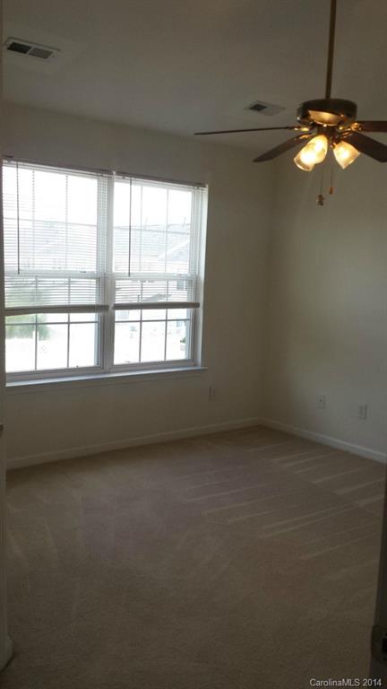 725 Shellstone Place, Unit 55 Fort Mill, SC 29708 - Photo 5 of 7 a view of an empty room with a window