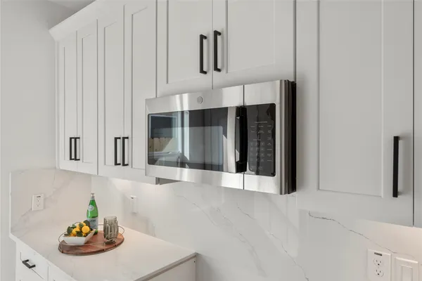 a view of kitchen with furniture and window
