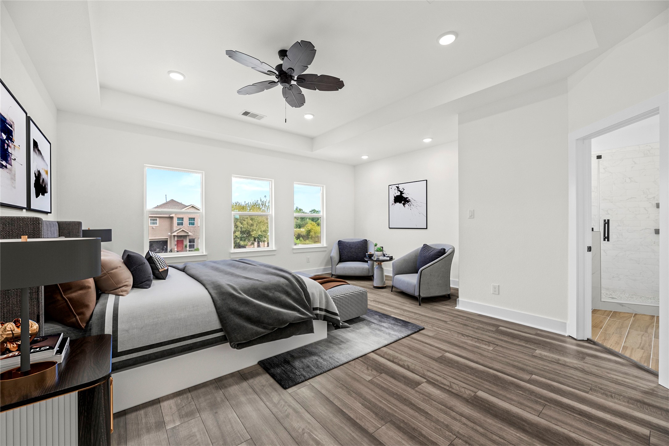 769 Marjorie Street Houston, TX 77088 - Photo 17 of 48 a bed room with bed and ceiling fan