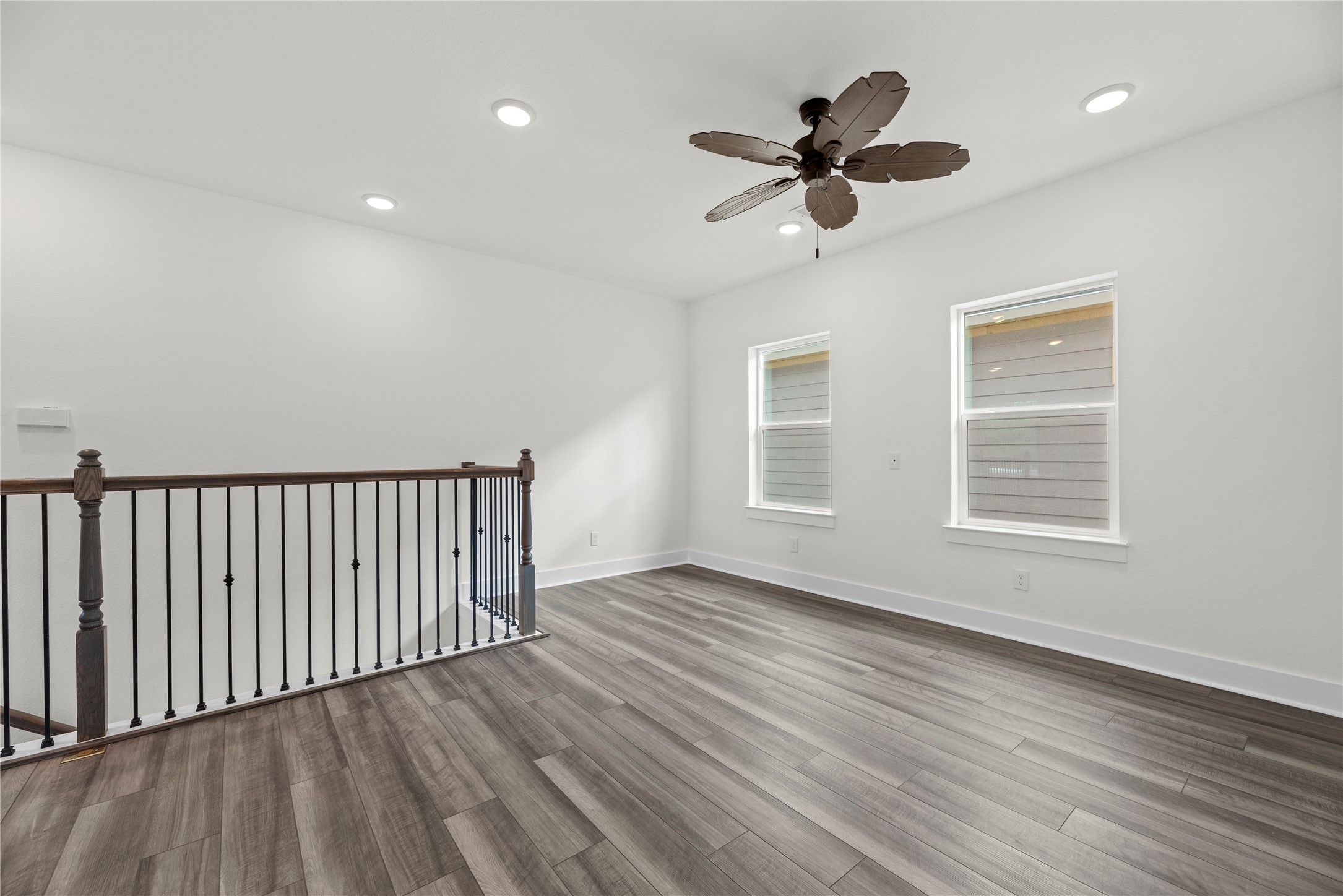 769 Marjorie Street Houston, TX 77088 - Photo 29 of 48 a view of an empty room with wooden floor and a window