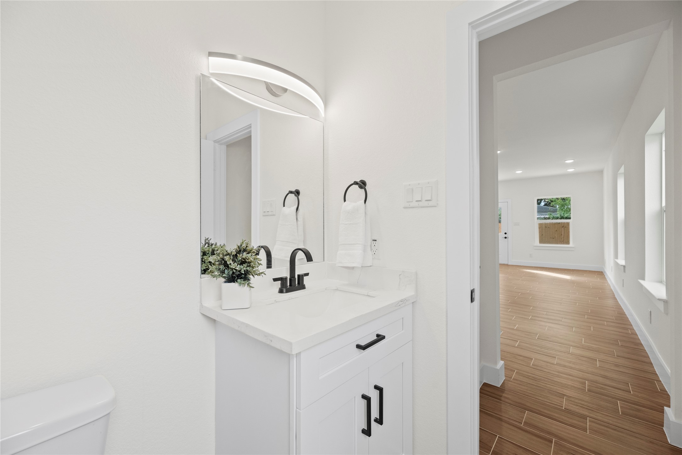 769 Marjorie Street Houston, TX 77088 - Photo 37 of 48 a bathroom with a sink and a mirror