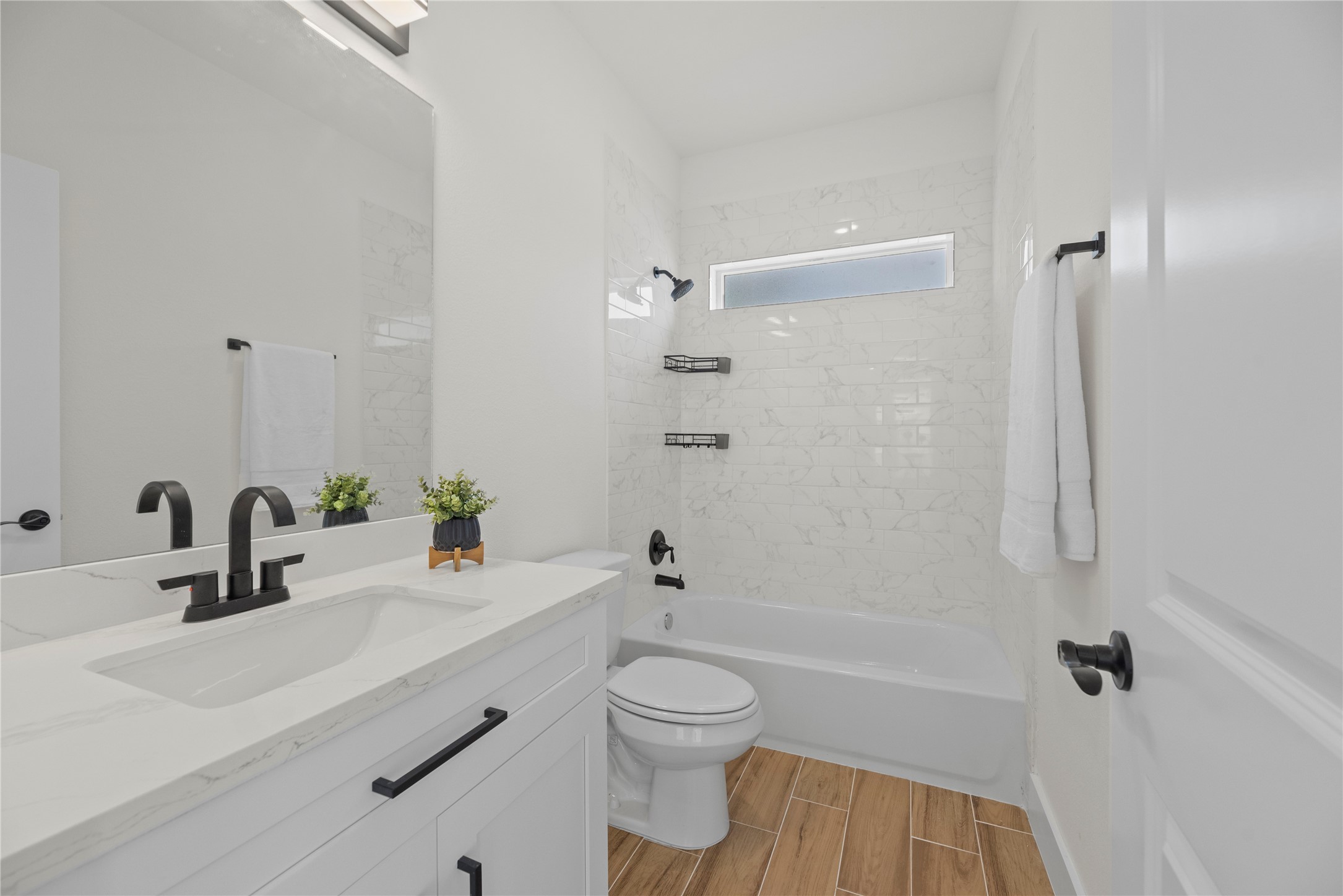 769 Marjorie Street Houston, TX 77088 - Photo 40 of 48 a bathroom with a sink a toilet and shower