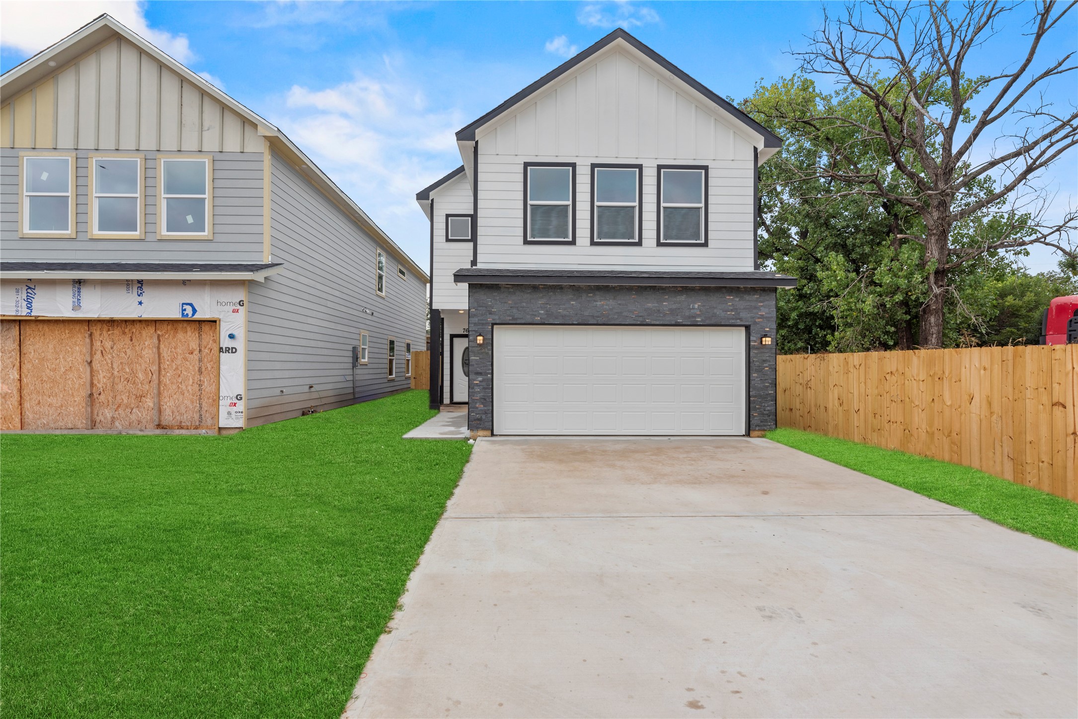 769 Marjorie Street Houston, TX 77088 - Photo 43 of 48 a front view of a house with a yard and garage