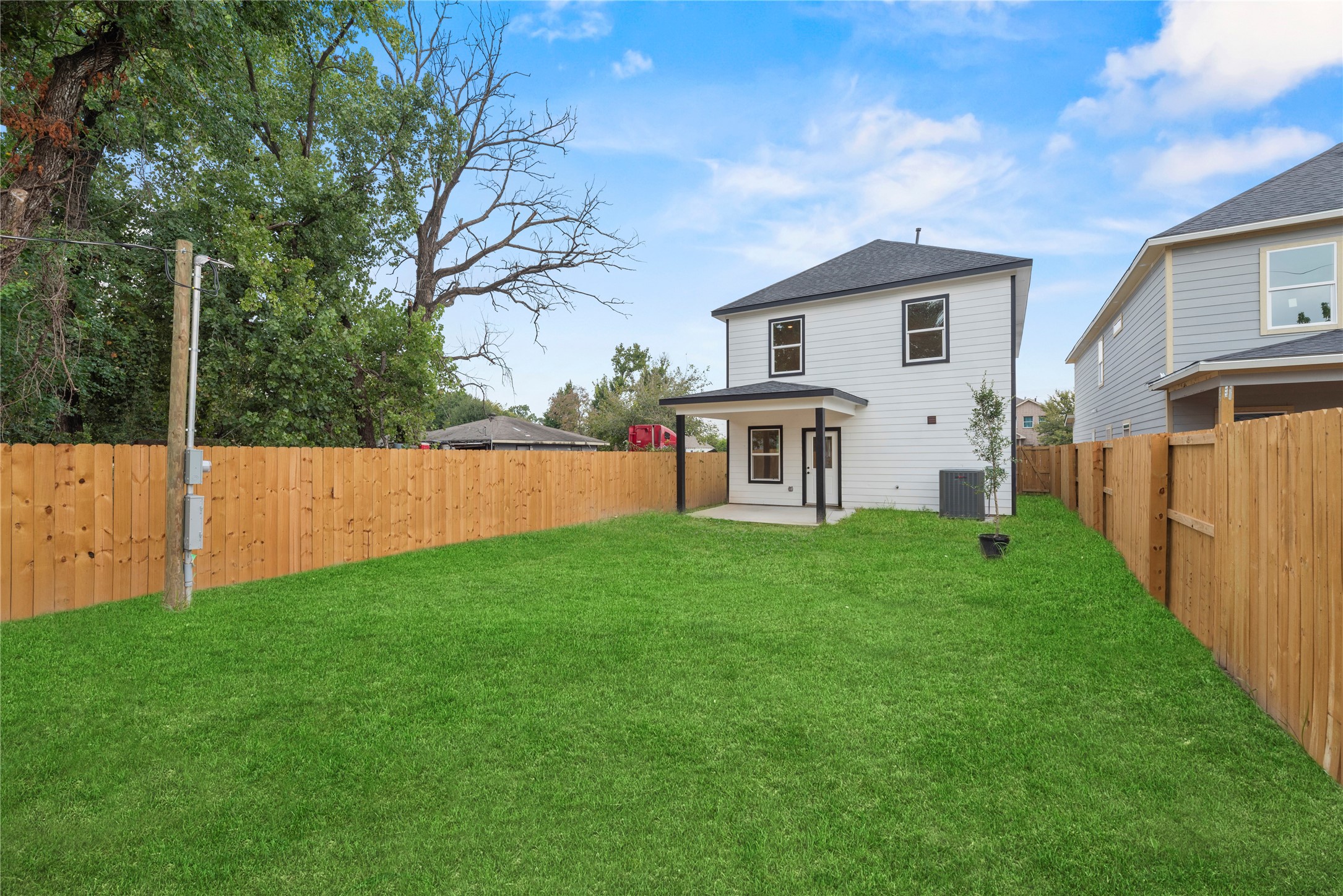 769 Marjorie Street Houston, TX 77088 - Photo 45 of 48 a backyard of a house with table and chairs