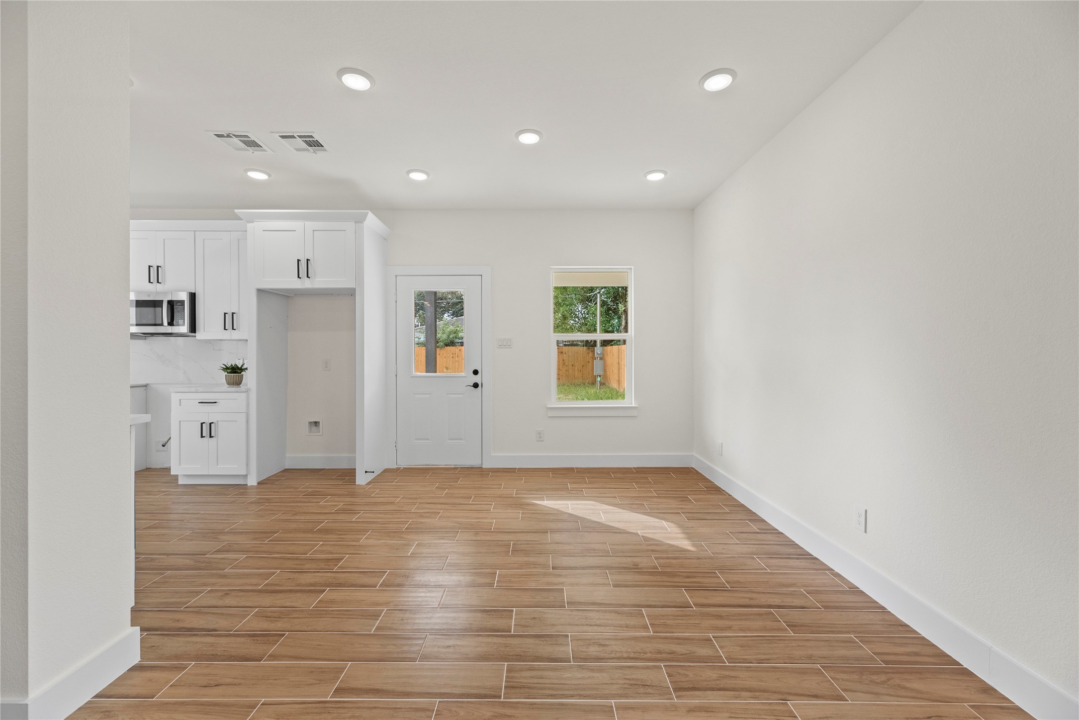 769 Marjorie Street Houston, TX 77088 - Photo 8 of 48 a view of an empty room with a window