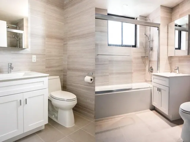a bathroom with a sink toilet and bathtub