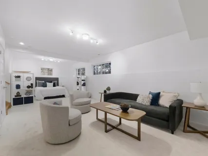 a living room with furniture and a couch