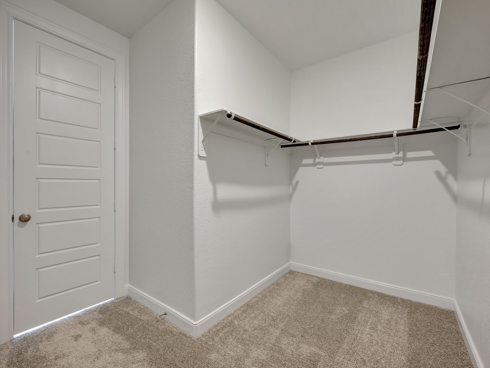 1645 Hopson Ranch Drive Conroe, TX 77301 - Photo 17 of 33 a view of an empty walk in closet