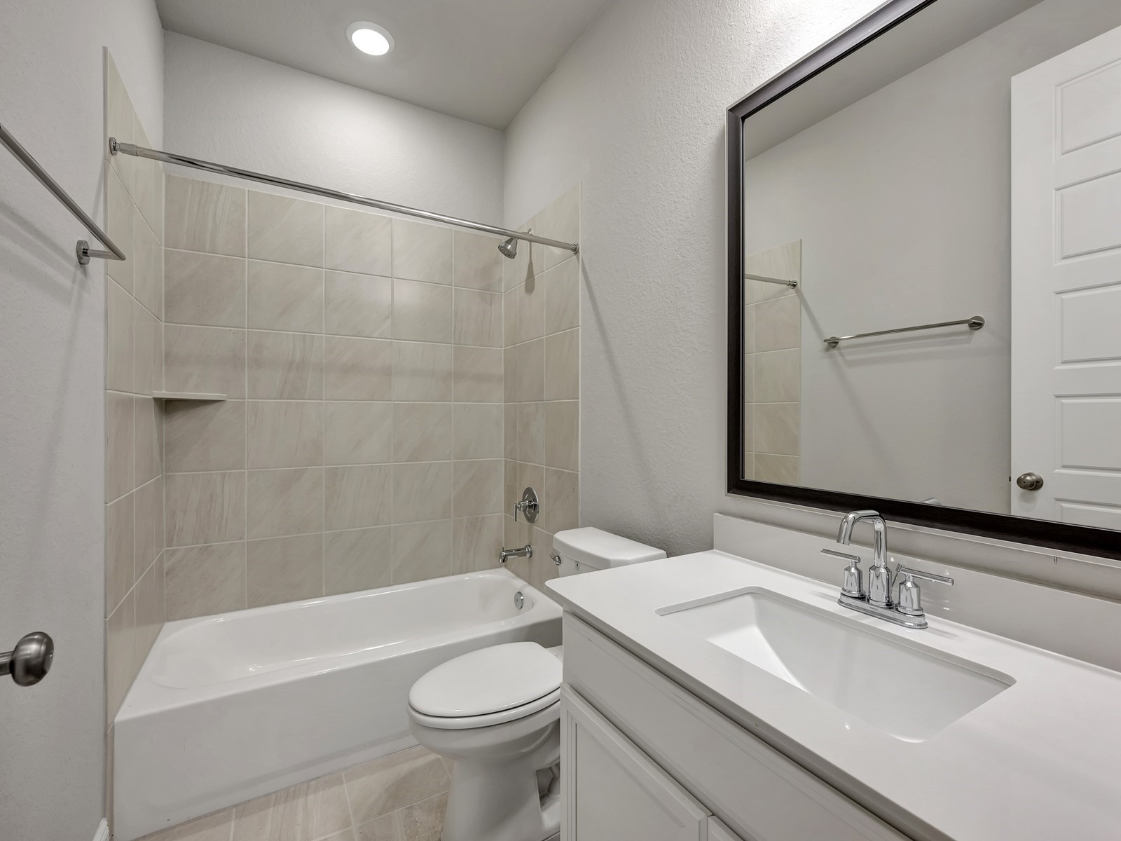 1645 Hopson Ranch Drive Conroe, TX 77301 - Photo 19 of 33 a bathroom with a granite countertop sink toilet and shower