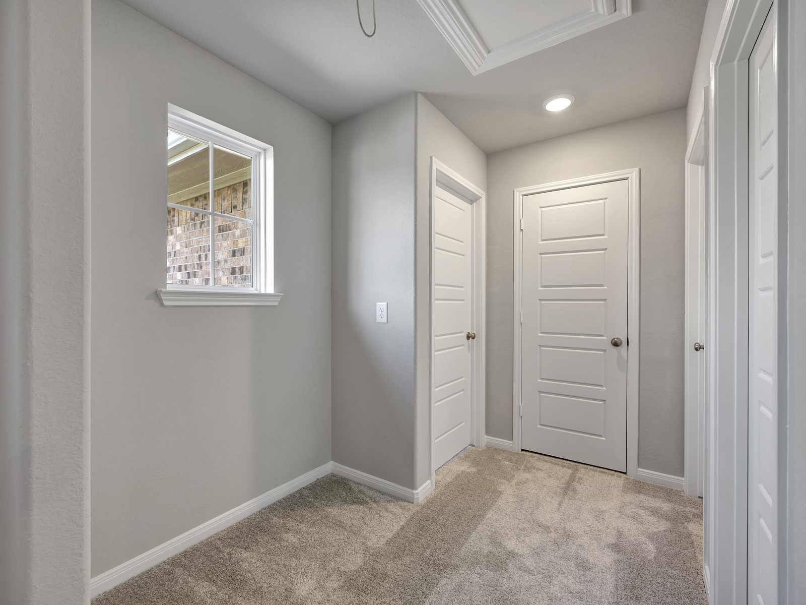 1645 Hopson Ranch Drive Conroe, TX 77301 - Photo 24 of 33 an empty room with windows and closet