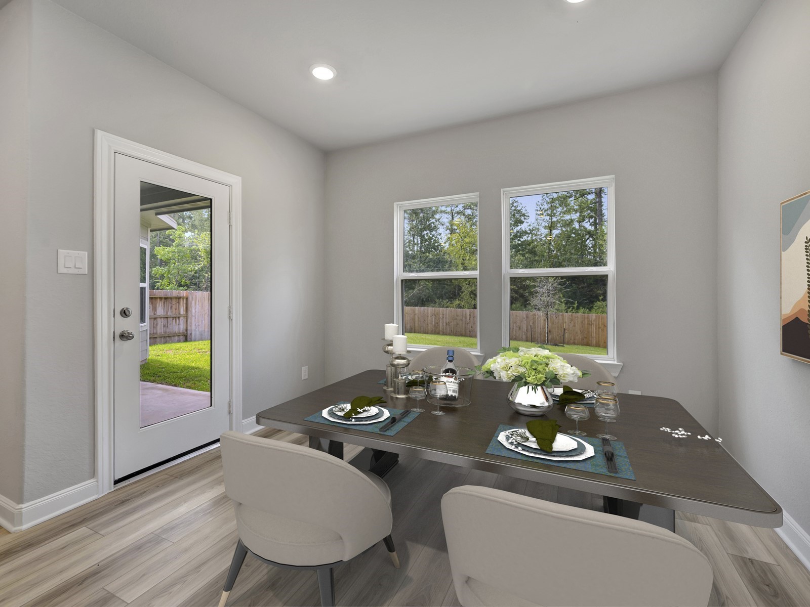 1645 Hopson Ranch Drive Conroe, TX 77301 - Photo 7 of 33 a view of a dining room with furniture and a potted plant