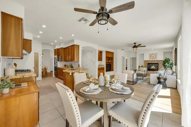 a bathroom with a sink a toilet and shower curtain