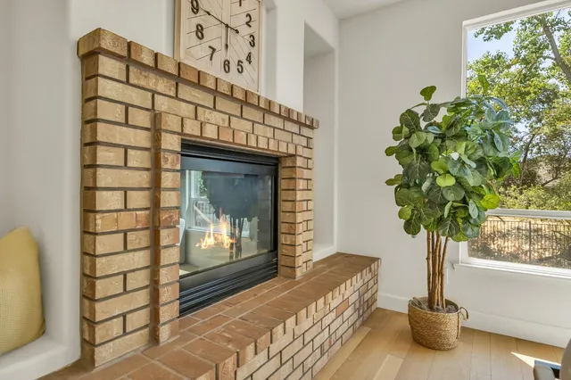 a spacious bedroom with a bed and a window