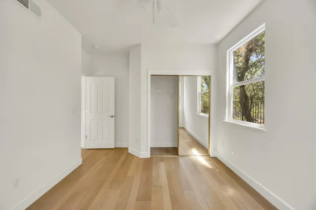a bathroom with a double vanity sink mirror and