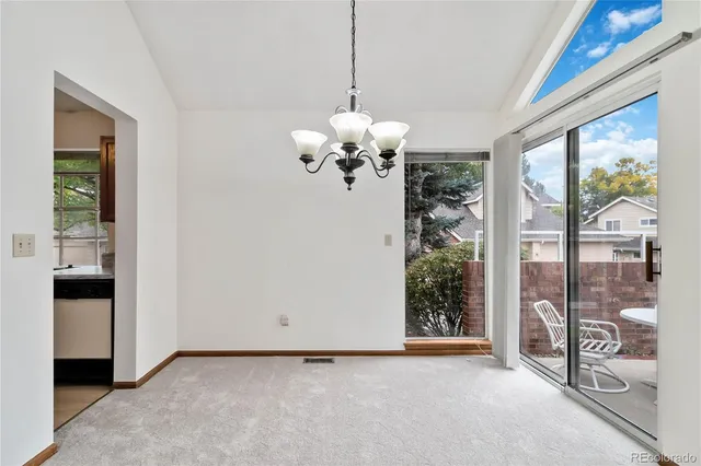 a view of a room with a large window