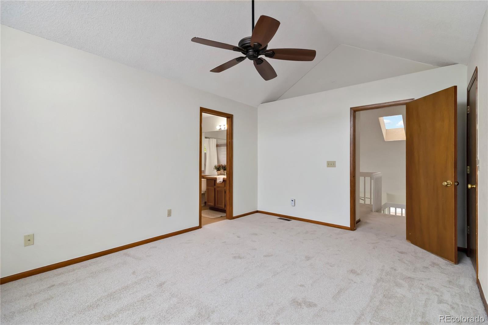 2136 South Scranton Way Aurora, CO 80014 - Photo 10 of 22 a view of empty room with a ceiling fan