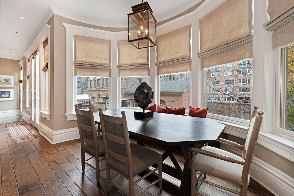 643 West Deming Place Chicago, IL 60614 - Photo 15 of 44 a view of a dining room with furniture window and wooden floor