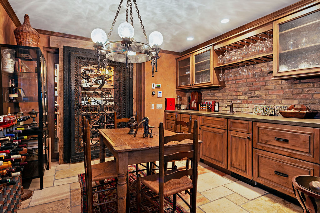 643 West Deming Place Chicago, IL 60614 - Photo 23 of 44 a view of a dining room with furniture and chandelier