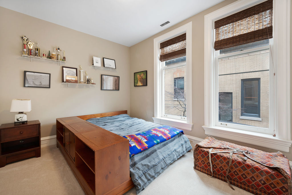 643 West Deming Place Chicago, IL 60614 - Photo 34 of 44 a bedroom with a bed and a window