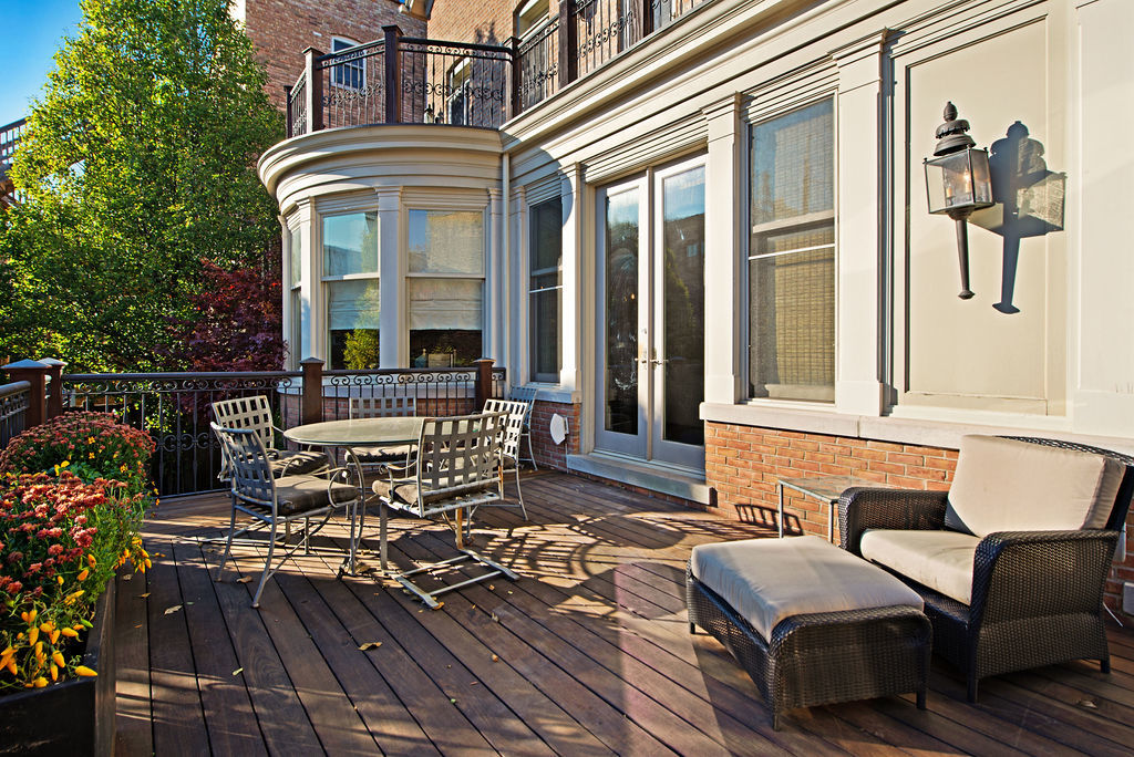 643 West Deming Place Chicago, IL 60614 - Photo 40 of 44 a view of a patio with couches chairs and wooden floor