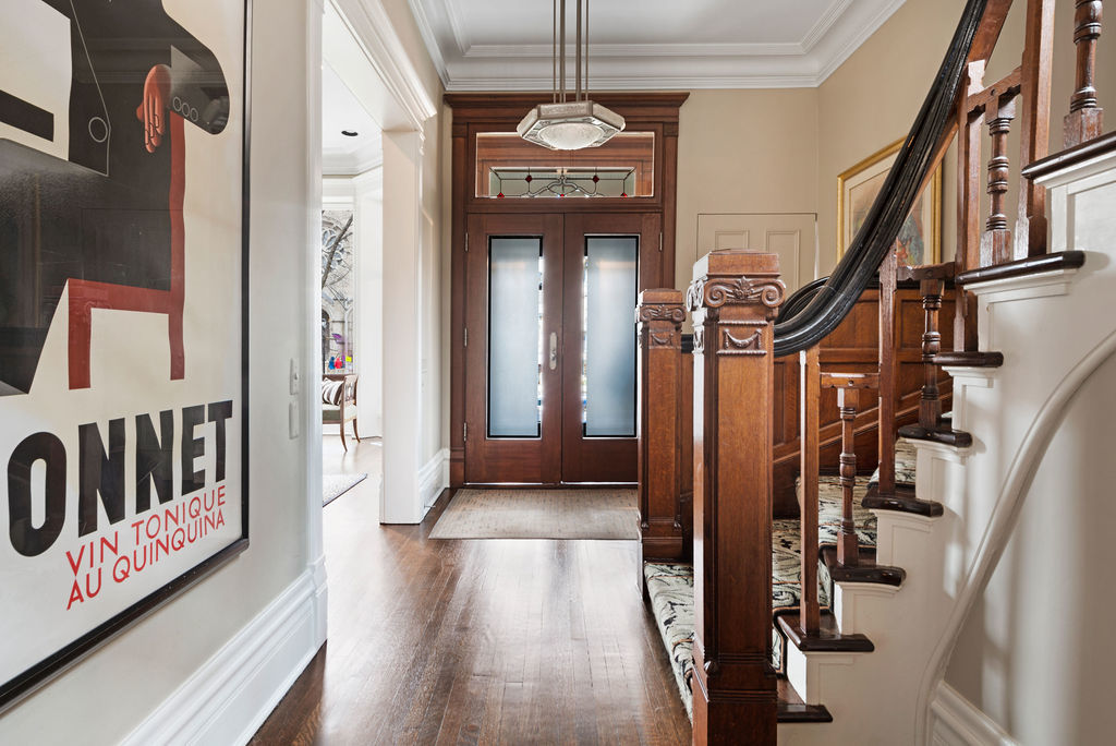 643 West Deming Place Chicago, IL 60614 - Photo 5 of 44 a view of hallway with stairs and wooden floor