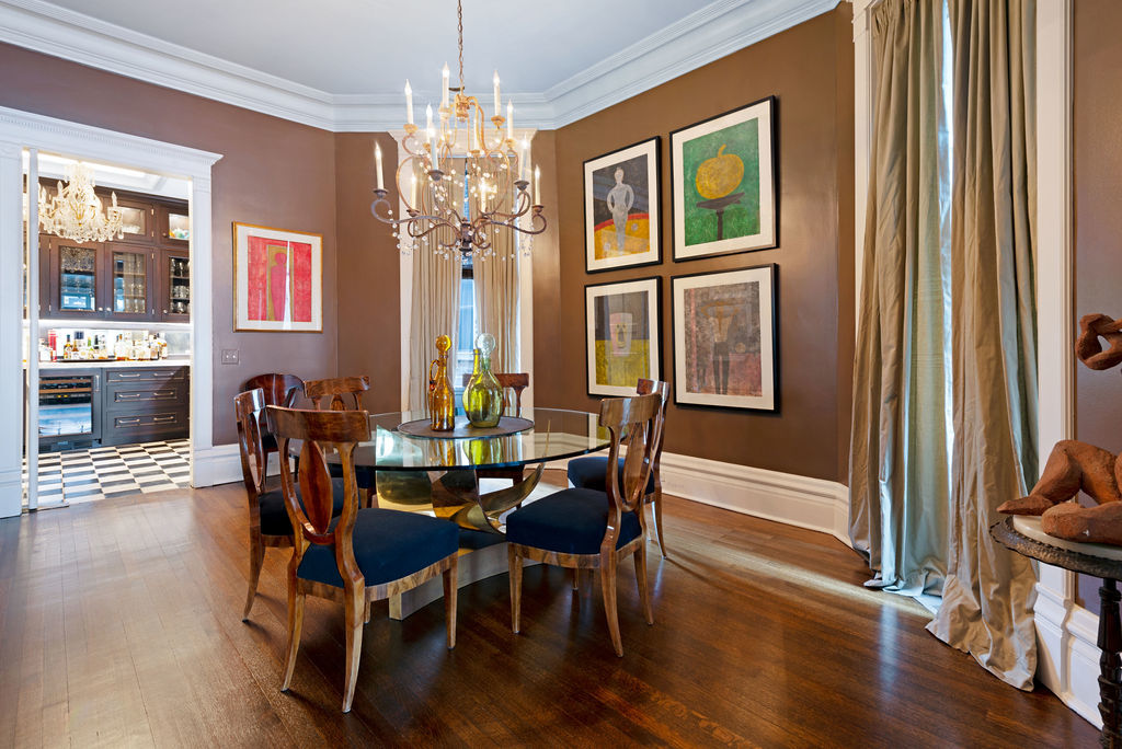 643 West Deming Place Chicago, IL 60614 - Photo 9 of 44 a view of a dining room with furniture a chandelier and wooden floor