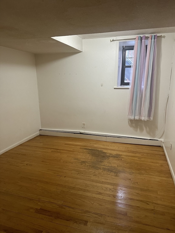 57 Brighton Avenue, Unit B Boston, MA 02134 - Photo 12 of 17 a view of an empty room