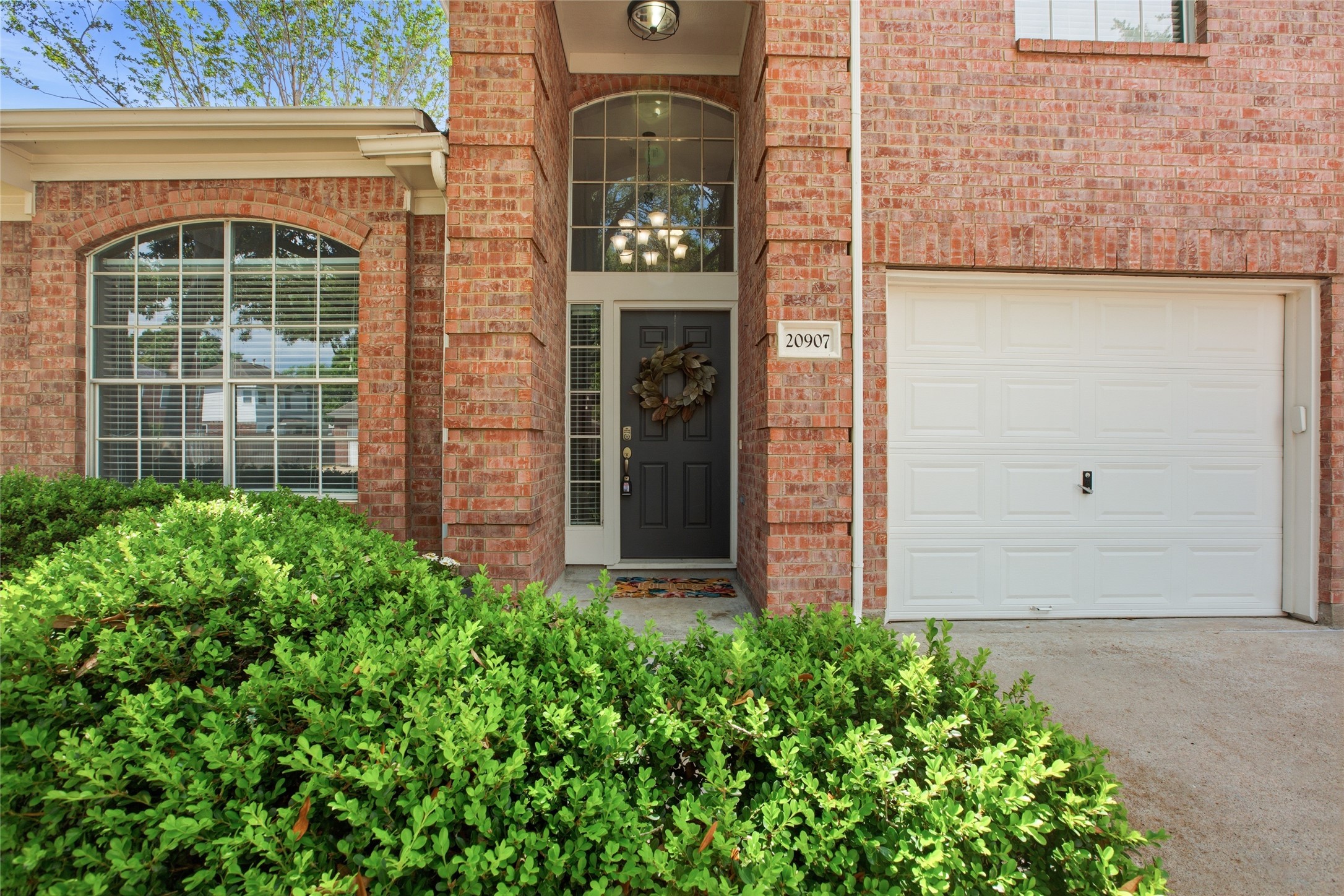 20907 Nettlebrook Lane Katy, TX 77450 - Photo 4 of 46 The brick exterior, framed by manicured landscaping, gives it a timeless, well-kept look. The covered front porch sets the tone from the start, creating a natural pause before stepping inside where mornings begin a little slower and evenings linger a little longer.