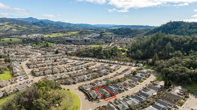 a view of a lot of trees and houses