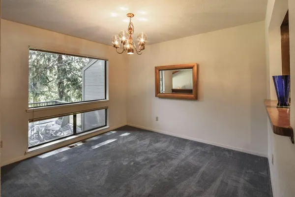 a bedroom with a bed and cabinets