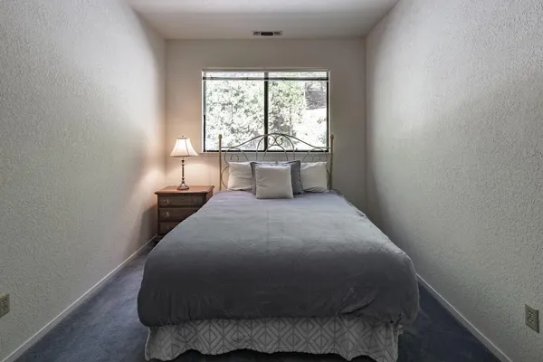 a view of backyard with outdoor seating