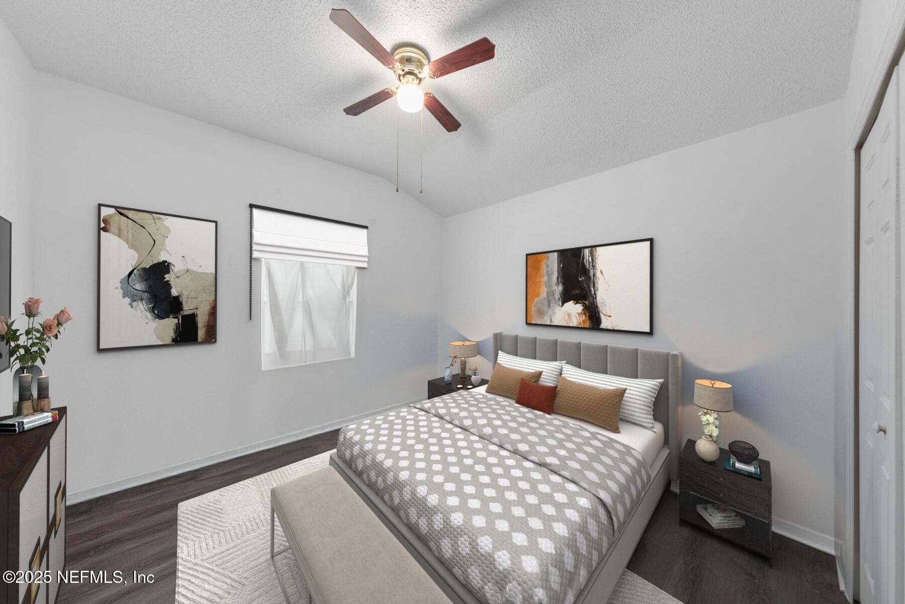 4219 Woodley Creek Road Jacksonville, FL 32218 - Photo 16 of 28 a bedroom with a bed and a painting on the wall