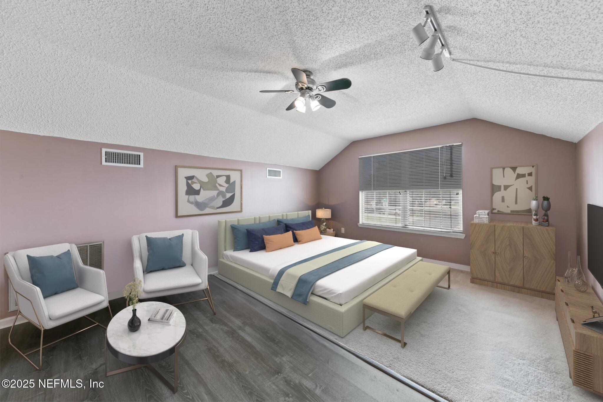4219 Woodley Creek Road Jacksonville, FL 32218 - Photo 22 of 28 a bedroom with a bed and a couch