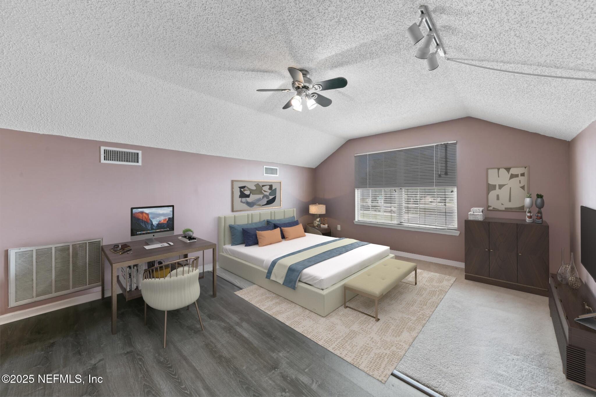4219 Woodley Creek Road Jacksonville, FL 32218 - Photo 23 of 28 a bedroom with a bed and a large window
