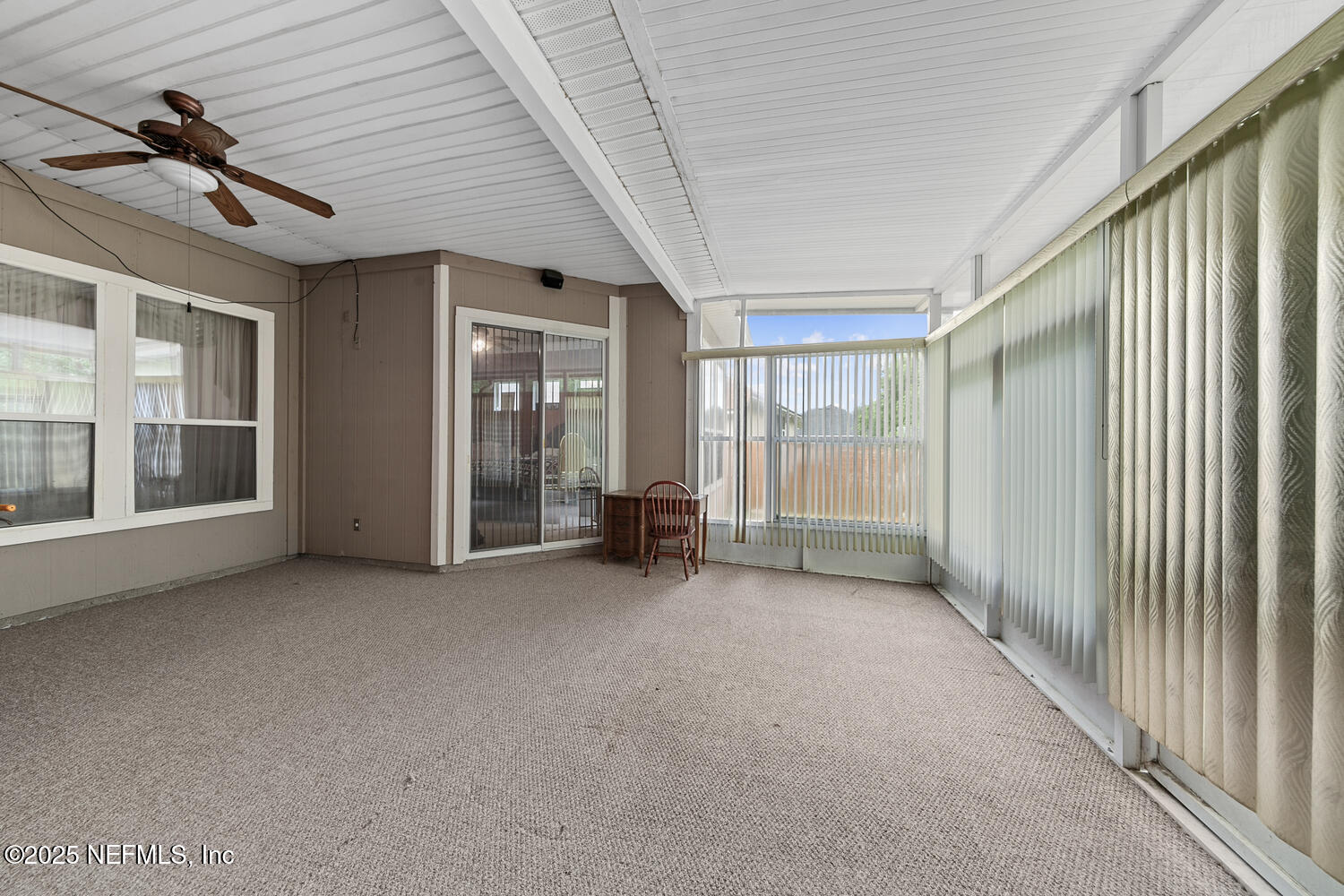 4219 Woodley Creek Road Jacksonville, FL 32218 - Photo 26 of 28 a view of a room with large windows